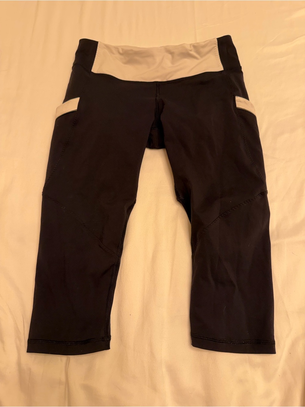 lululemon athletica Black and Cream Capri Leggings with Zip Pocket size 6